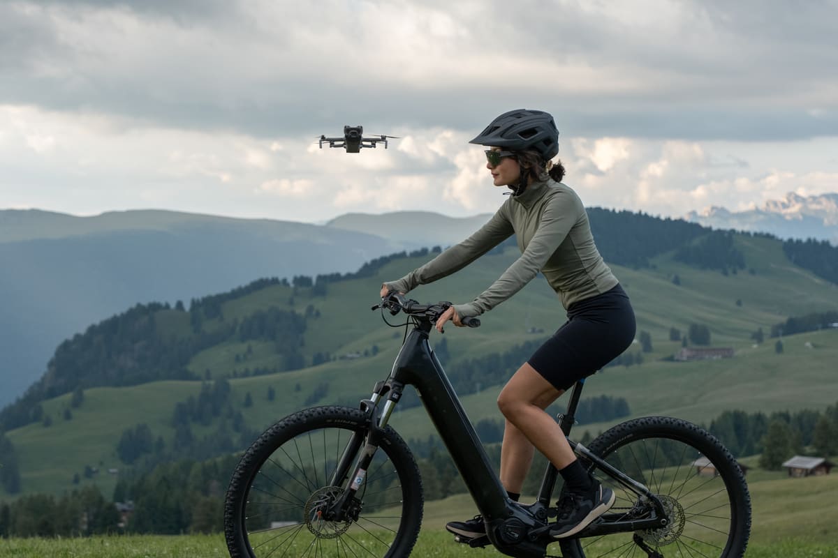 DJI Mini 5 Pro tracking a cyclist using an intelligent flight mode