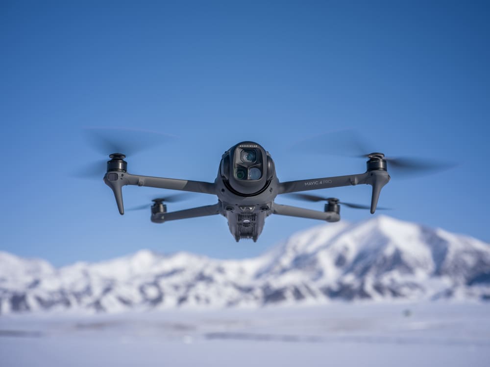 DJI Mavic 4 Pro flying (high-end drone for real estate photography)
