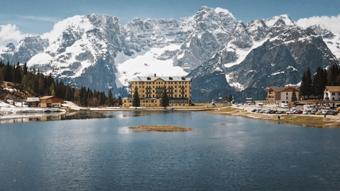 Aero Timelapse Studio Dolo GIF timelapse of Dolomites Italy mountains clouds light changes alpine scenery for portfolio and tourism marketing
