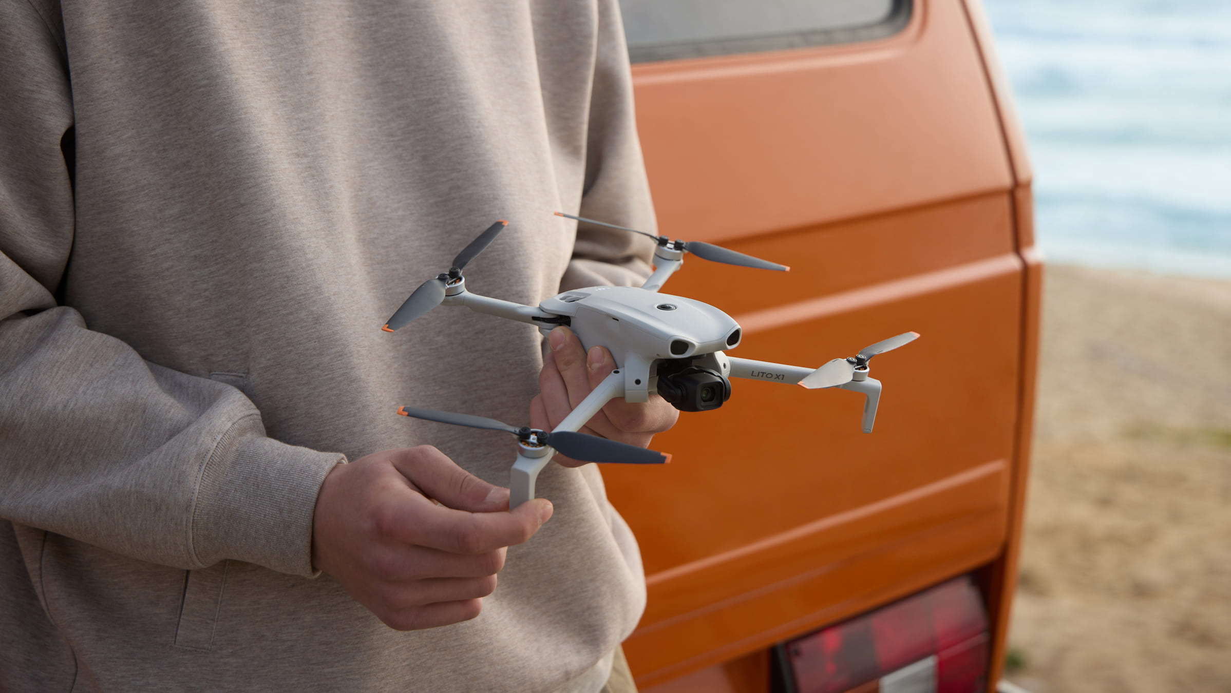 Why Is DJI Lito Not in the US - Hero Image - A person holding DJi Lito X1 in Hand